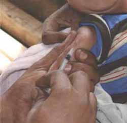 A child being given the BCG vaccine in their upper right arm © AMREF Demsissew Bizuwork