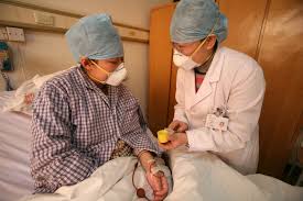 A patient being treated for TB in China © WHO
